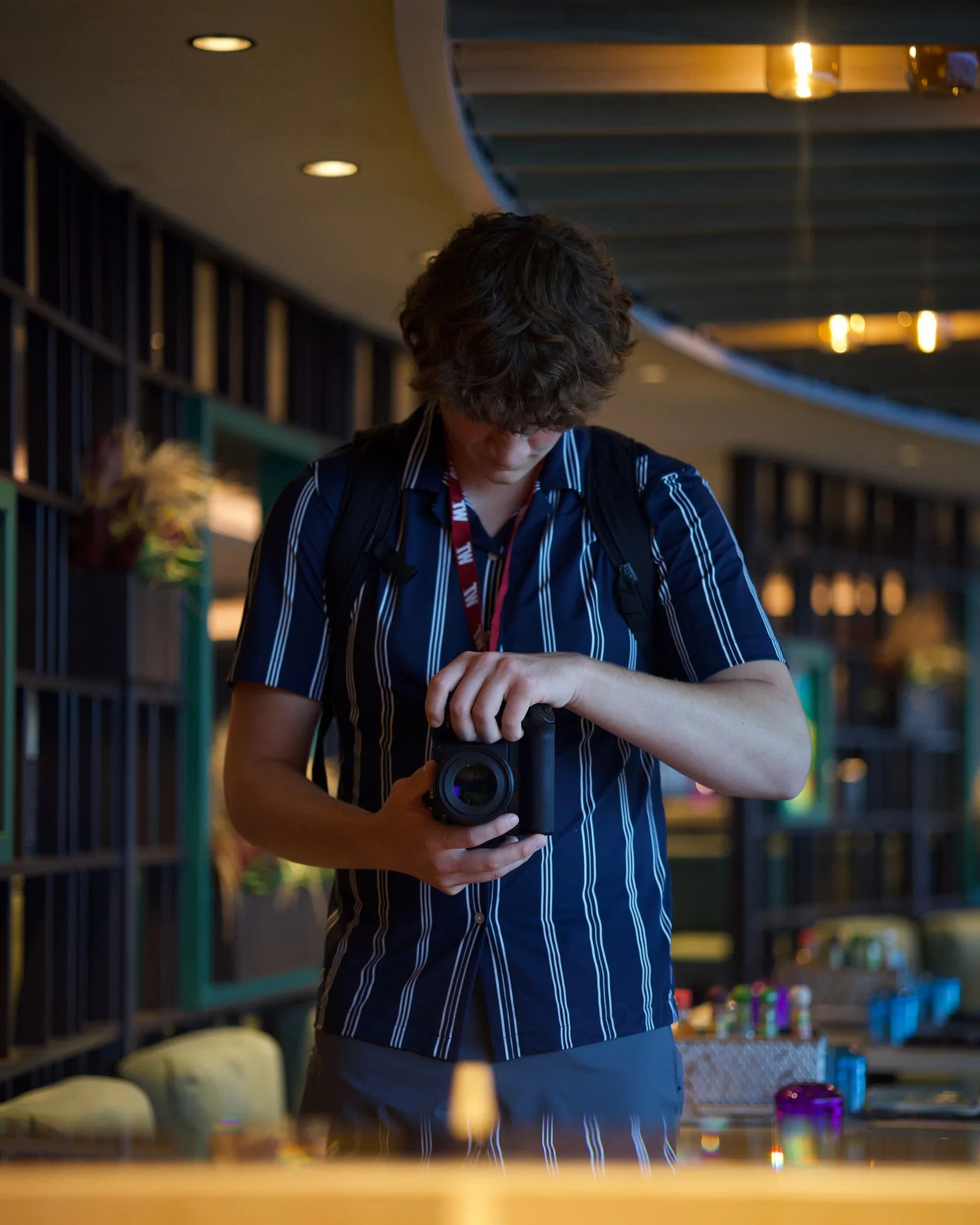 Cooper Patel checking the back of his camera